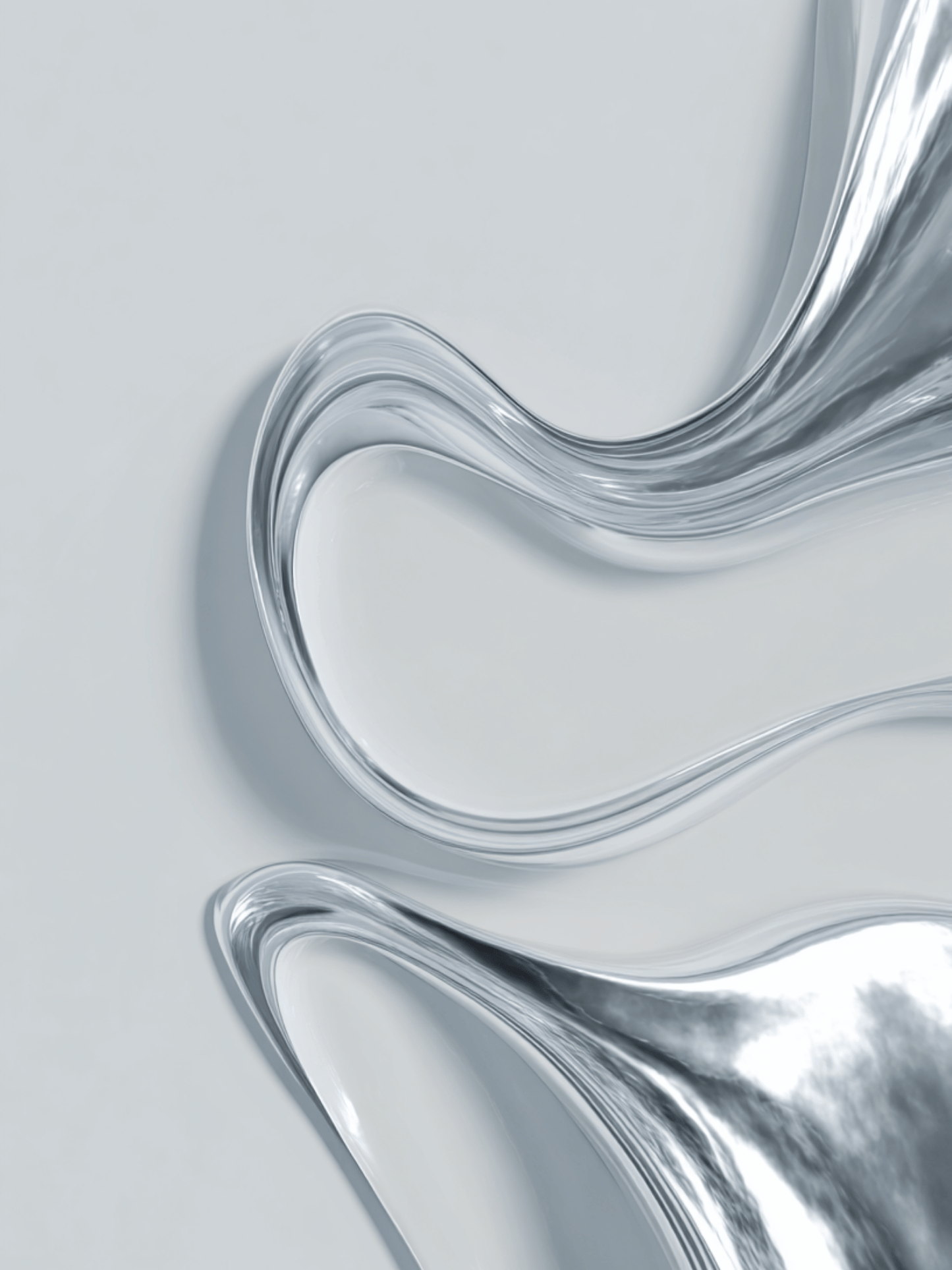 Liquid chrome wave on soft grey background